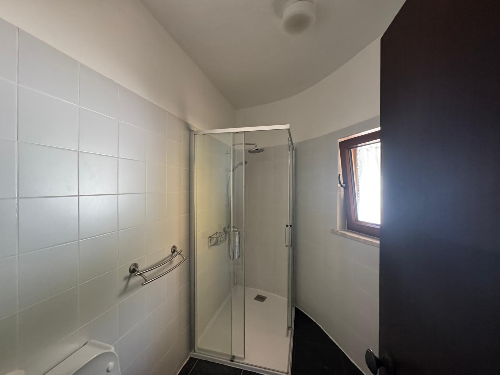 Casa das Rochas bathroom with walk-in shower