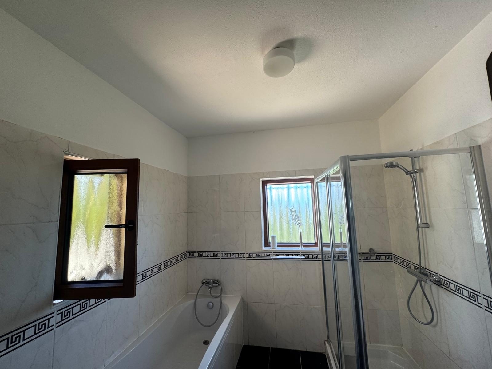 Casa das Rochas bathroom with bathtub