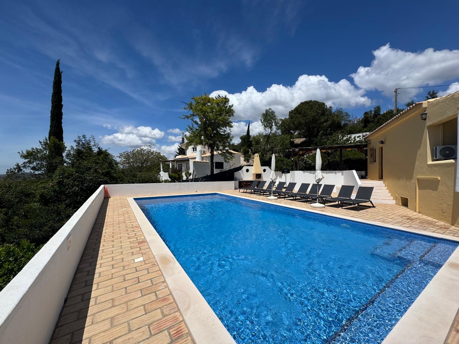 Casa das Rochas pool in the evening