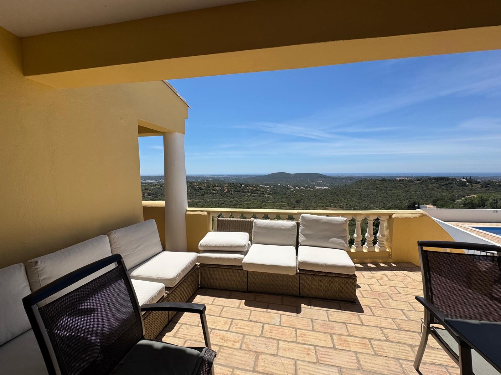 Casa das Rochas terrace lounge with countryside view